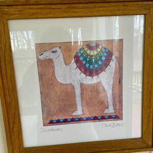 Original illustration of a camel in woodgrain frame